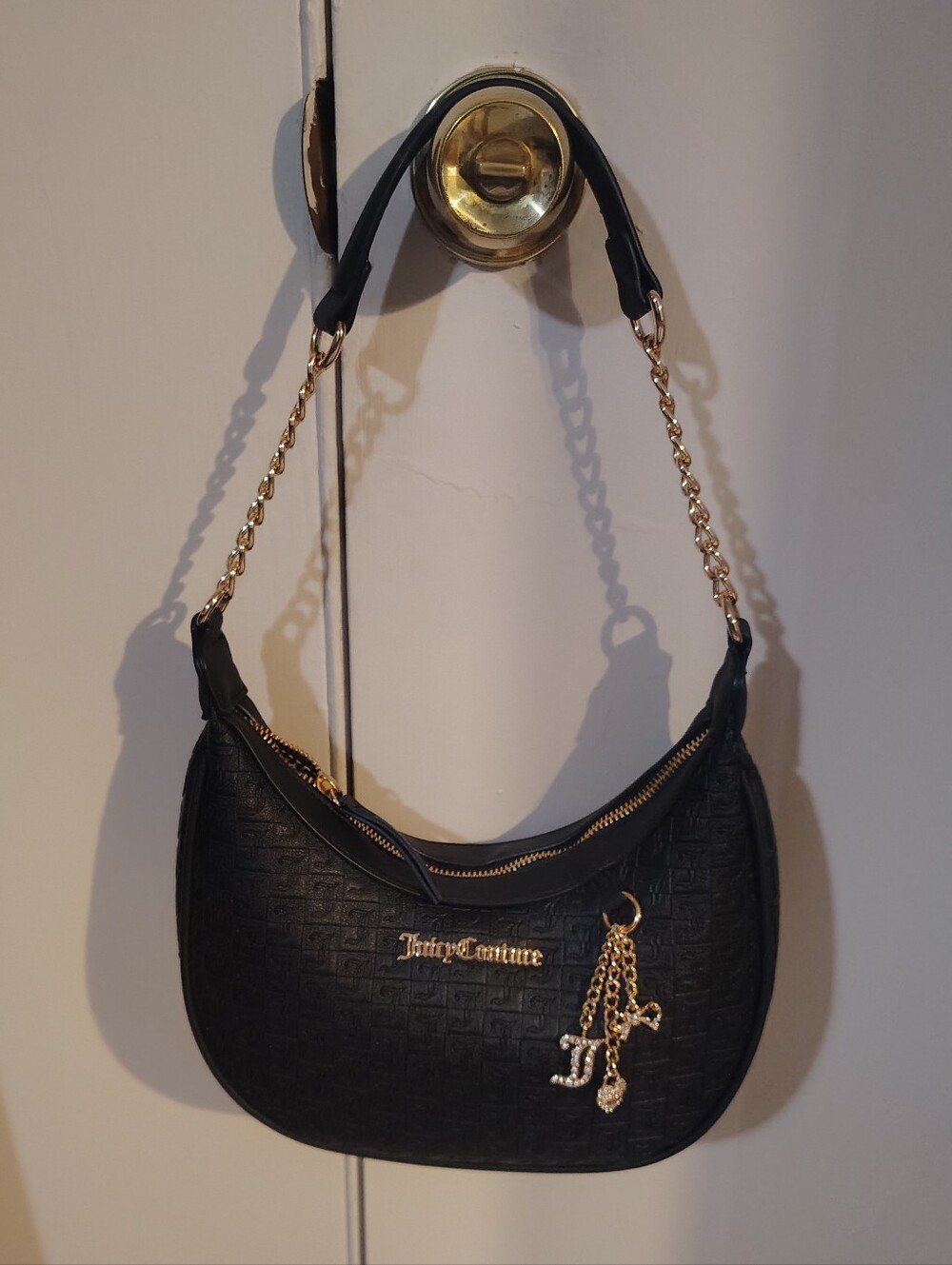 Juicy Couture Black Quilted Shoulder Bag with Gold Chain Accents